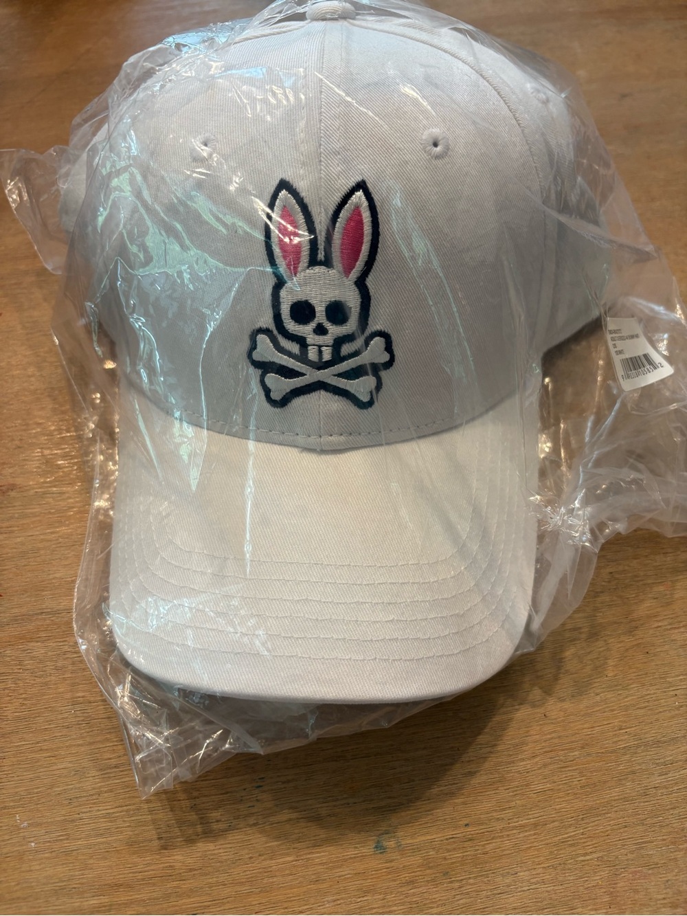 Psycho Bunny White Baseball Cap with Pink Ear Accent